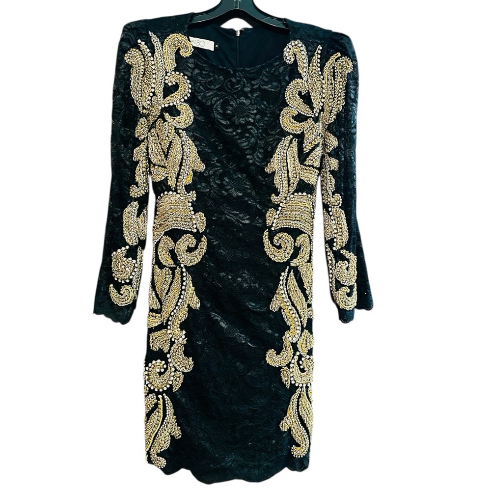 Patbo gold leaf embellished design. Size 4 shoulder padded